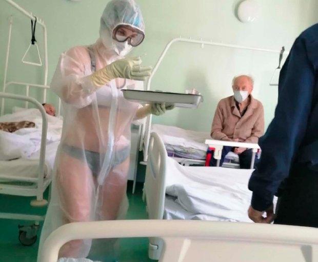 因为天气太热，俄罗斯一女护士在防护服内只穿比基尼？但医生、企业家都赞同护士！