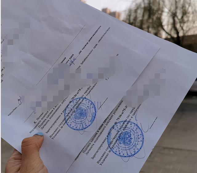 人民币不到，代办费还是值得的。此次拿到的俄语驾照和行驶证翻译公证件