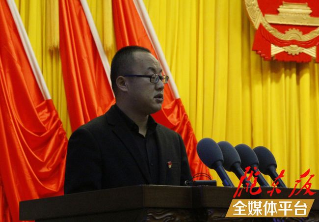 邱军同志先进事迹报告会在华池县举行