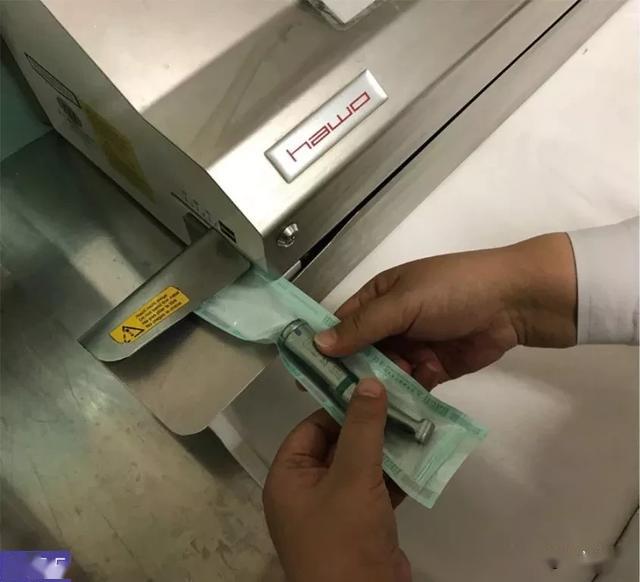 步骤 将注油后的牙科手机打包封装.