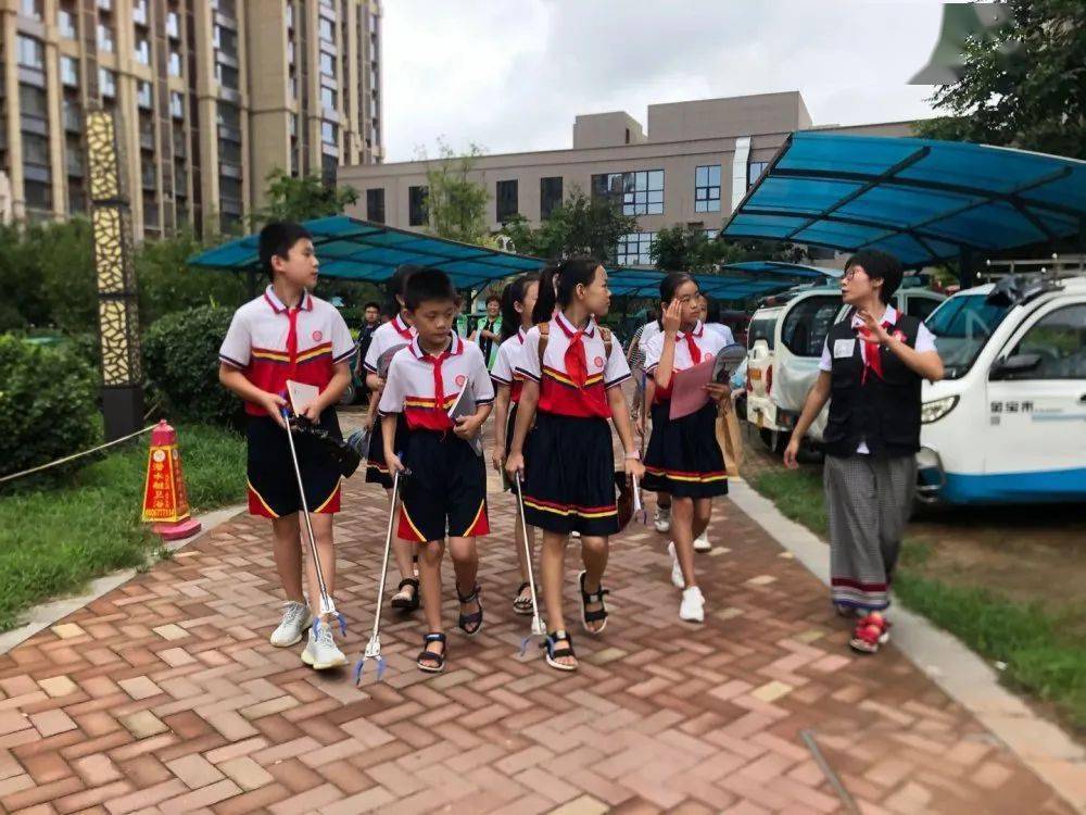 小手拉大手创卫我先行山东省济南市济北小学开展主题实践活动