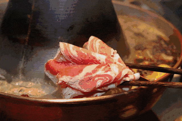 怎么卷牛肉切片 10d1b8624e66492e91b34ca6f86912ca.gif