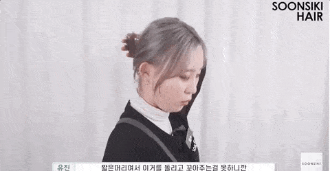 ④选择抓力比较紧的鲨鱼夹,全部夹住后面的头发,短发根据发量的多少