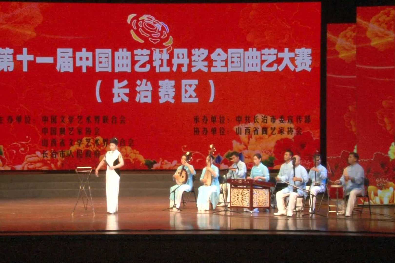 张华表演长子鼓书