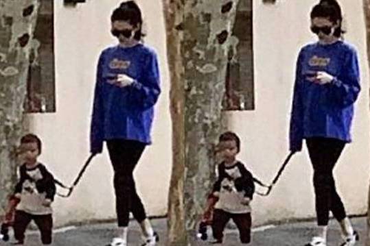 奚梦瑶挺孕肚街头遛娃