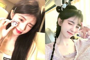 鞠婧祎对镜拍比耶俏皮