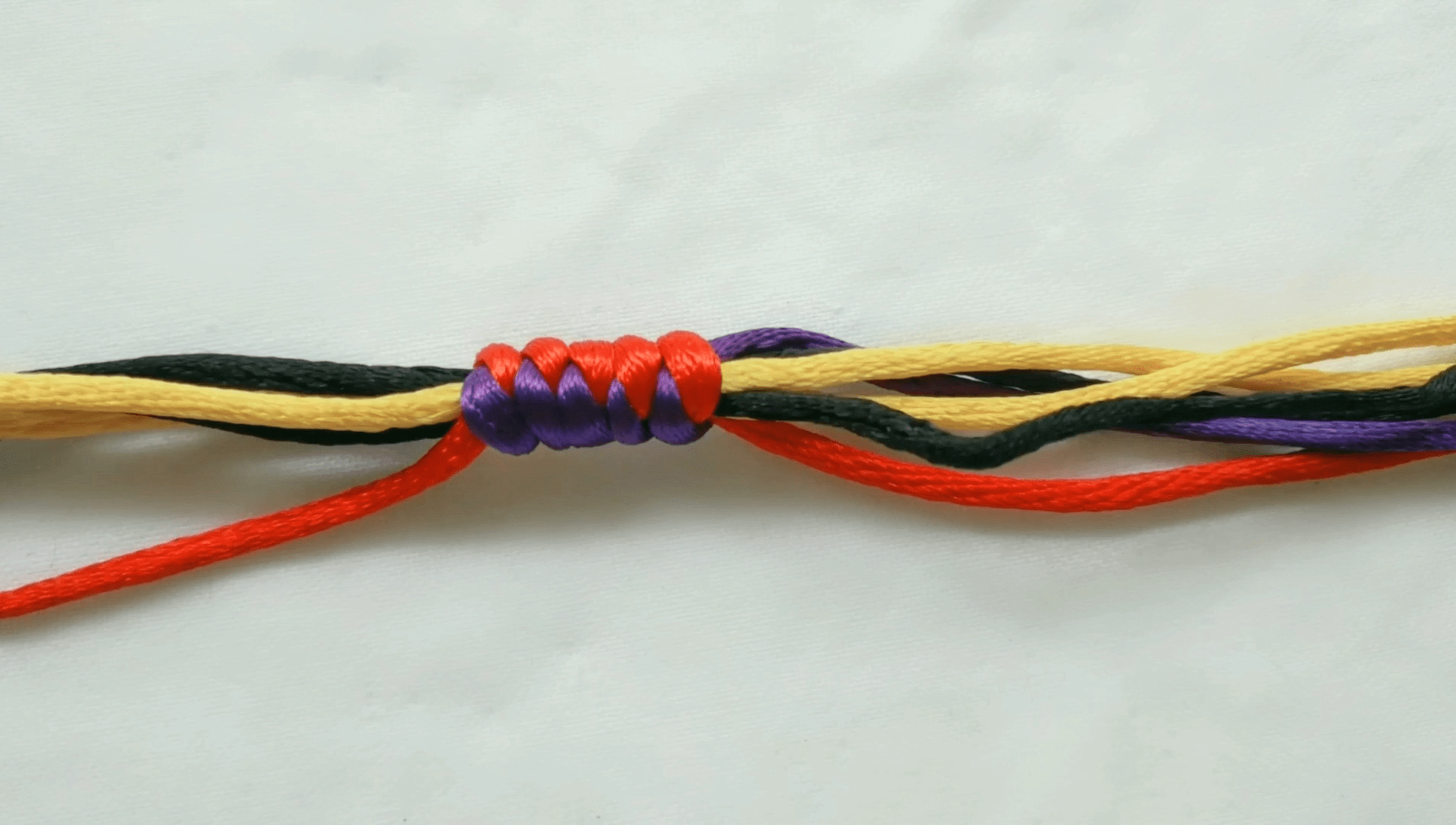 手工编绳教程蛇结包边的方法