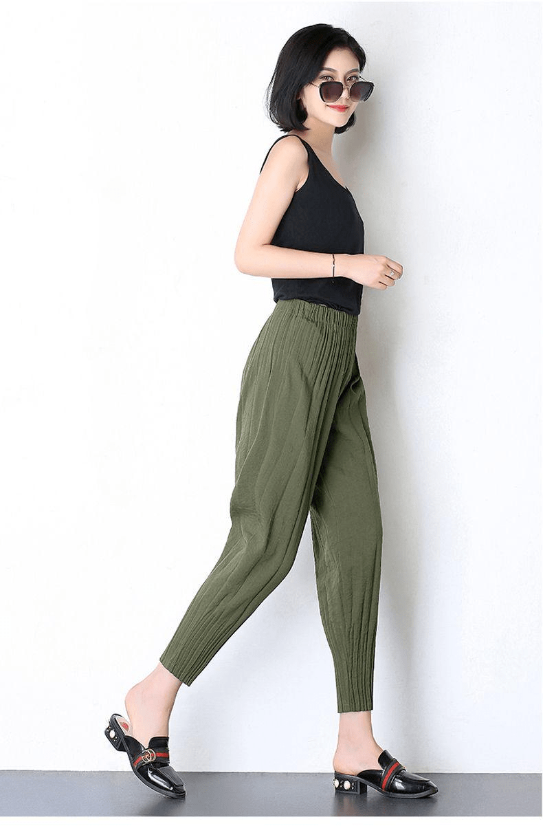 徐帆简约穿搭也时髦蝙蝠袖上衣搭灯笼裤休闲度假风十足