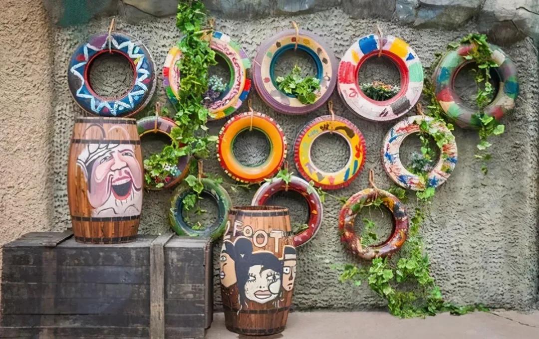 花瓣型轮胎花盆将轮胎进行适当的分割,改造,组合,不仅可以形成有利于