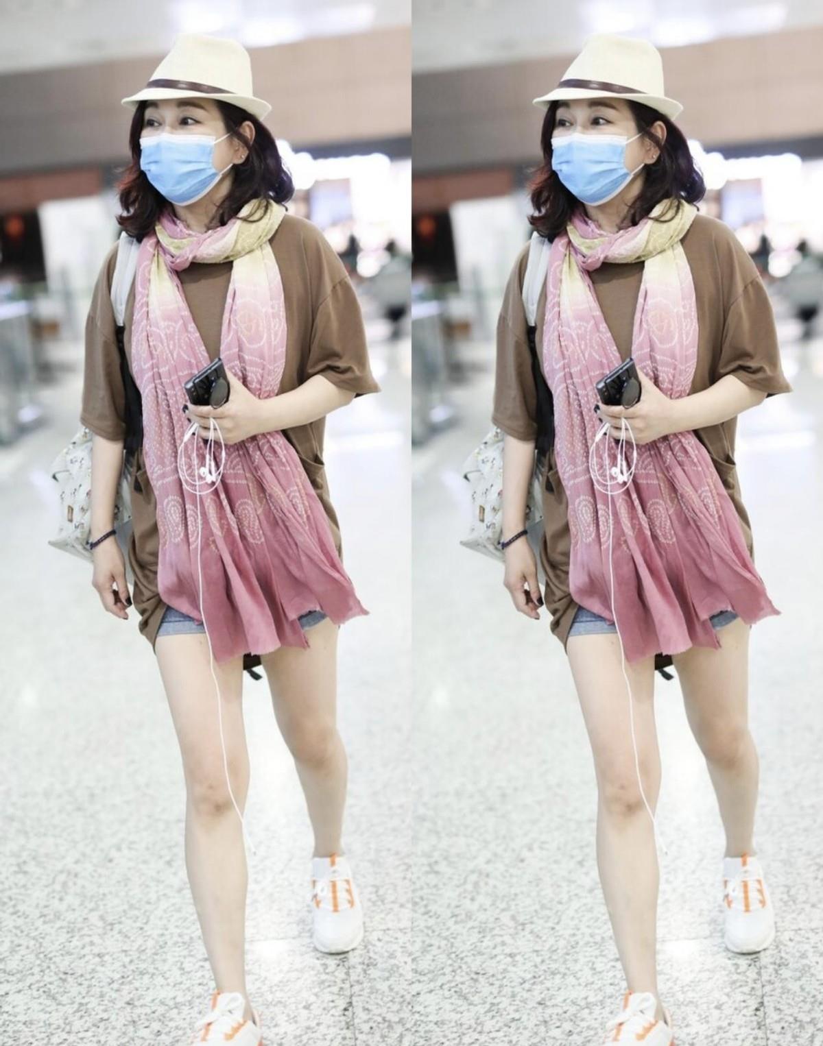 老公 粉色不仅显嫩还优雅，年已半百的陈松伶，同框小7岁老公也不违和