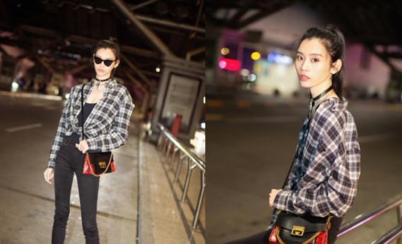 卫衣 奚梦瑶不愧是模特出身,上衣和裙子用圆环挂着,腰线超抢眼的