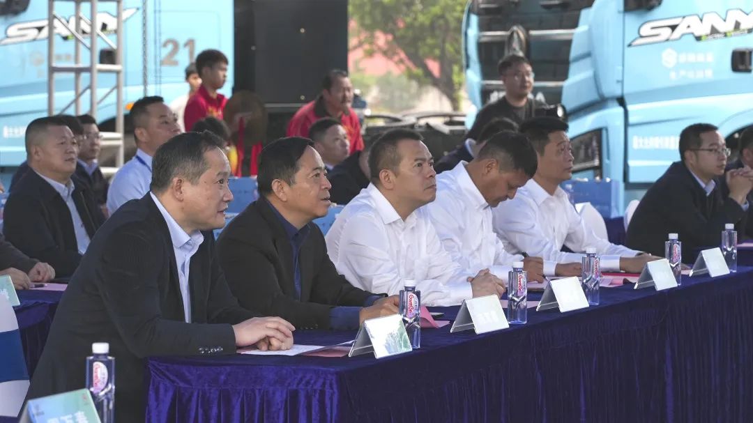 防城港市人民政府党组成员,副市长潘展东,盛隆冶金总经理柯雪利,盛隆