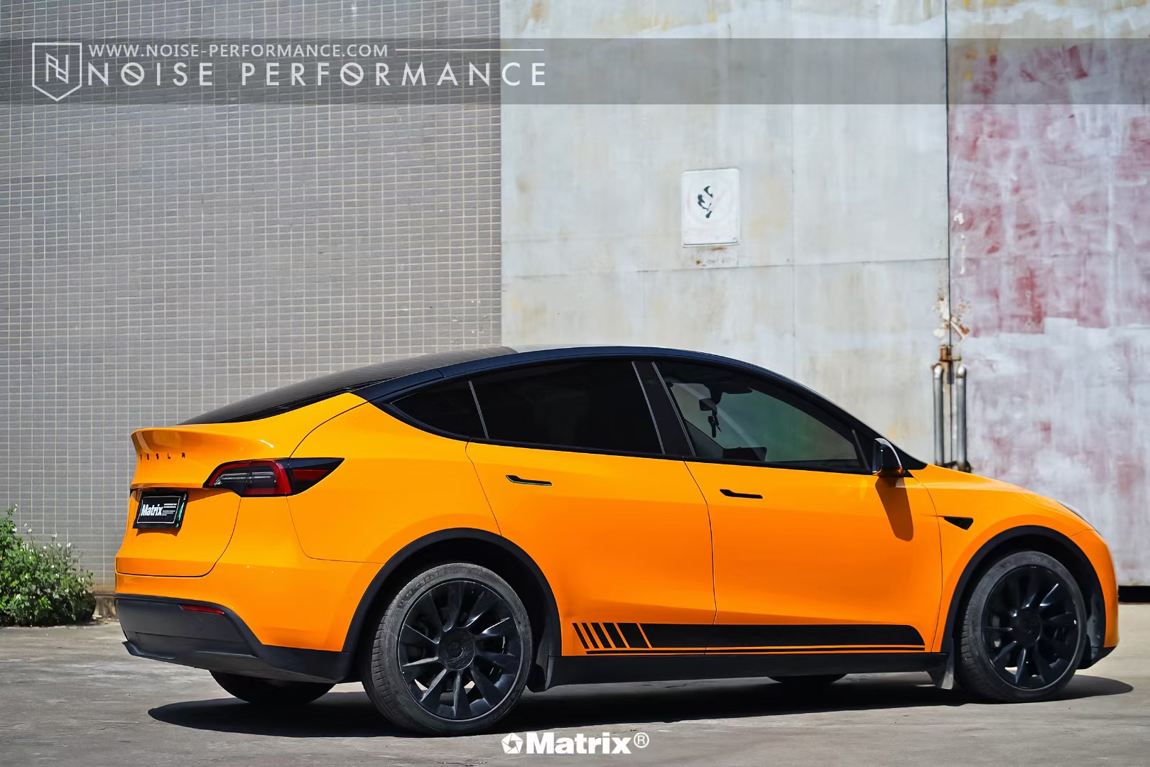 特斯拉modely-matrix矩阵改色膜迈凯伦橙,彰显着无限的年轻与活力