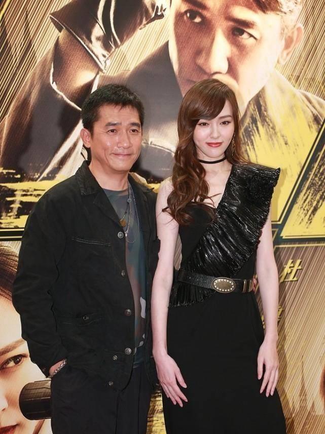 唐嫣与大21岁梁朝伟并肩,感觉也并不输气质,还比梁朝伟高半头_时尚_单