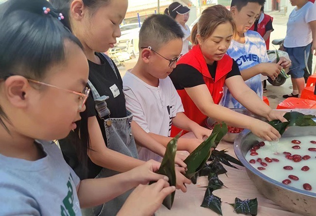 容城县平王乡开展"粽"享欢乐·浓情端午主题活动_居民_社区_节日