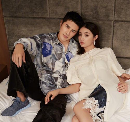 麦迪娜晒儿女合照,2岁丹尼尔抱着妹妹哄她入睡,兄妹俩颜值满分_姜潮