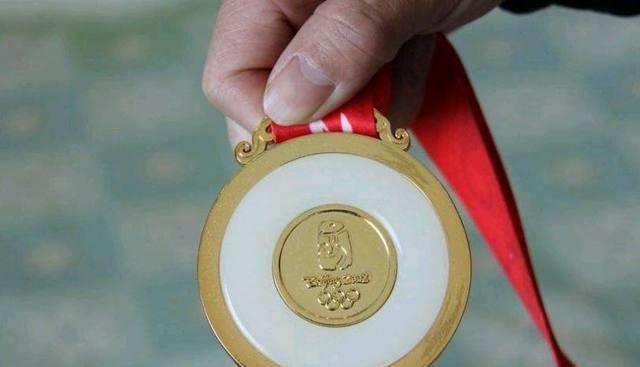 北京奥运会,金牌的含金是6.