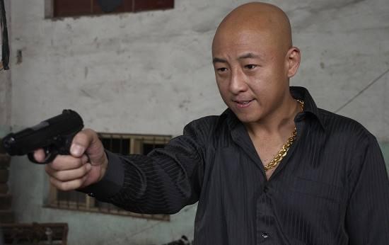 2014年,《战狼》筹拍,吴京给发小周晓鸥打去电话:"周亲人,我给你留了