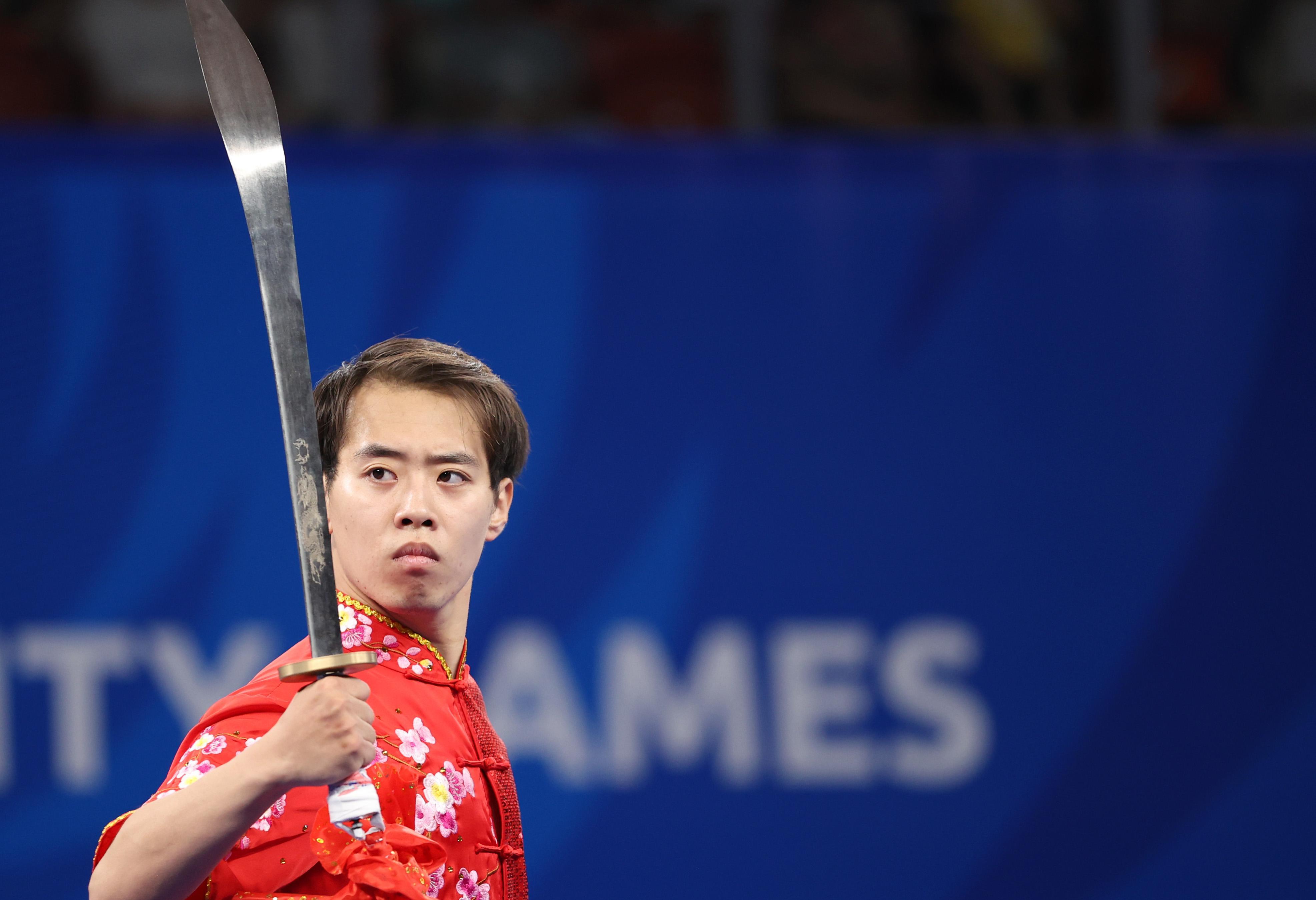 (成都大运会)武术-男子刀术:我们选手金哲典夺金_贾浩_新华社_比赛