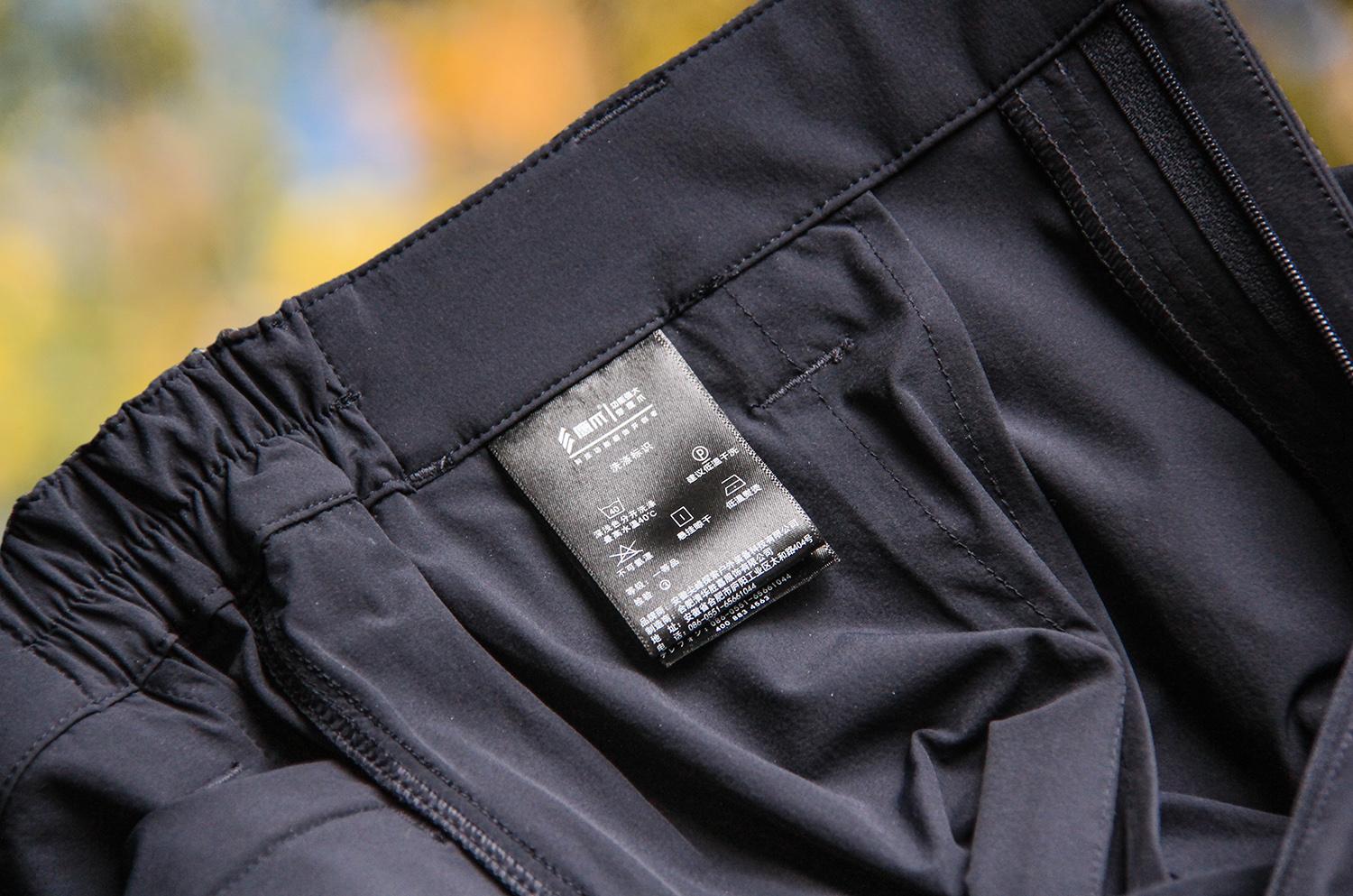 至裆部约27厘米,通过缝线勾勒出裤子整体的线条轮廓,双线加固和打枣