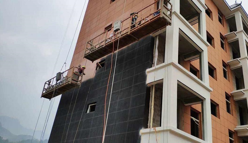 外墙真石漆施工工艺,外墙涂料施工_进行_分格_喷涂