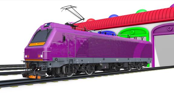 乐享知识乐园的紫色火车车头玩具从车库缓缓驶出