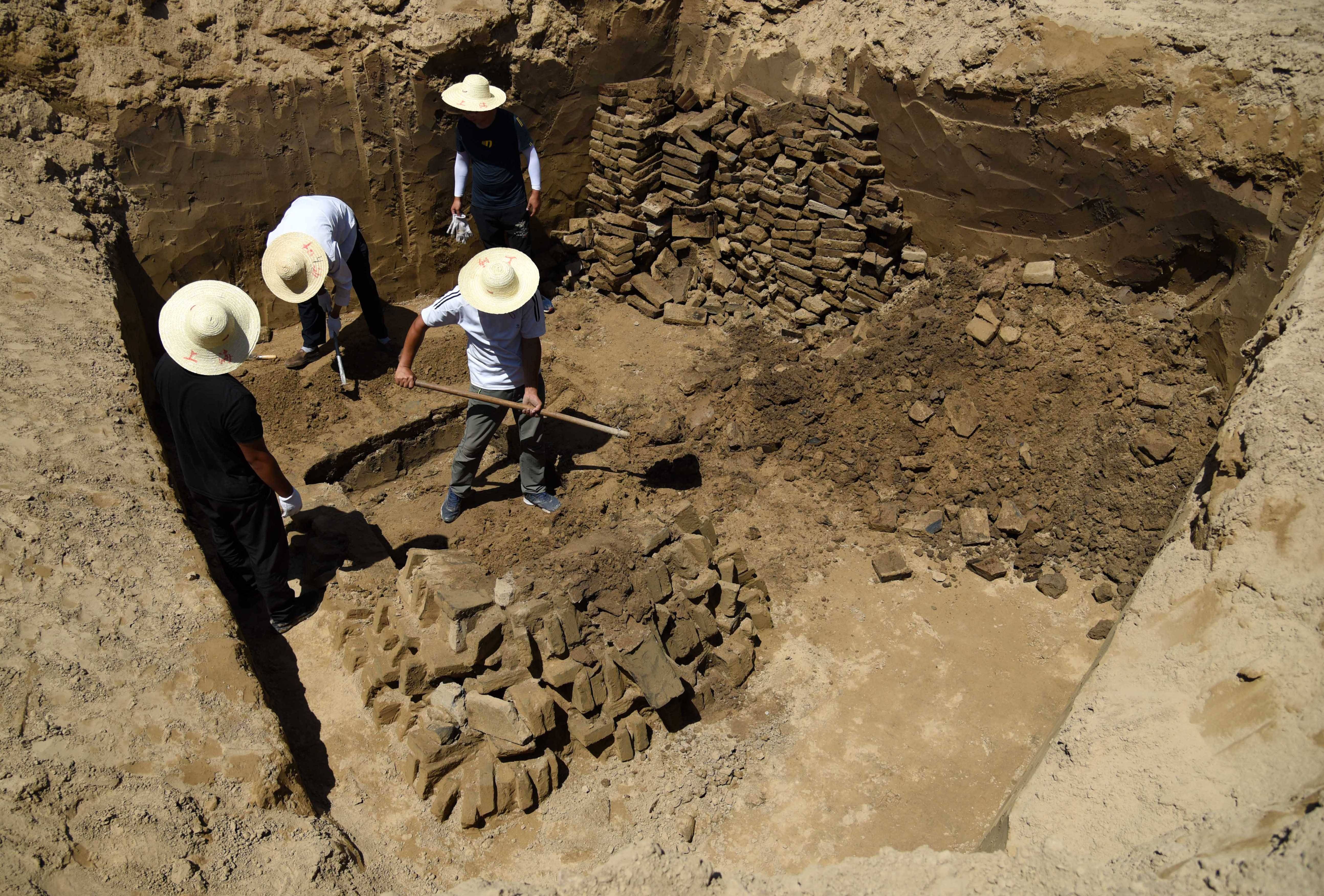这是6月14日拍摄的山东小清河章丘段考古发掘现场