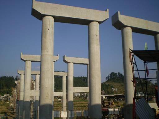 对不同桥宽, 不同跨径简支梁板桥的盖梁内力计算结果进行分析, 以双柱