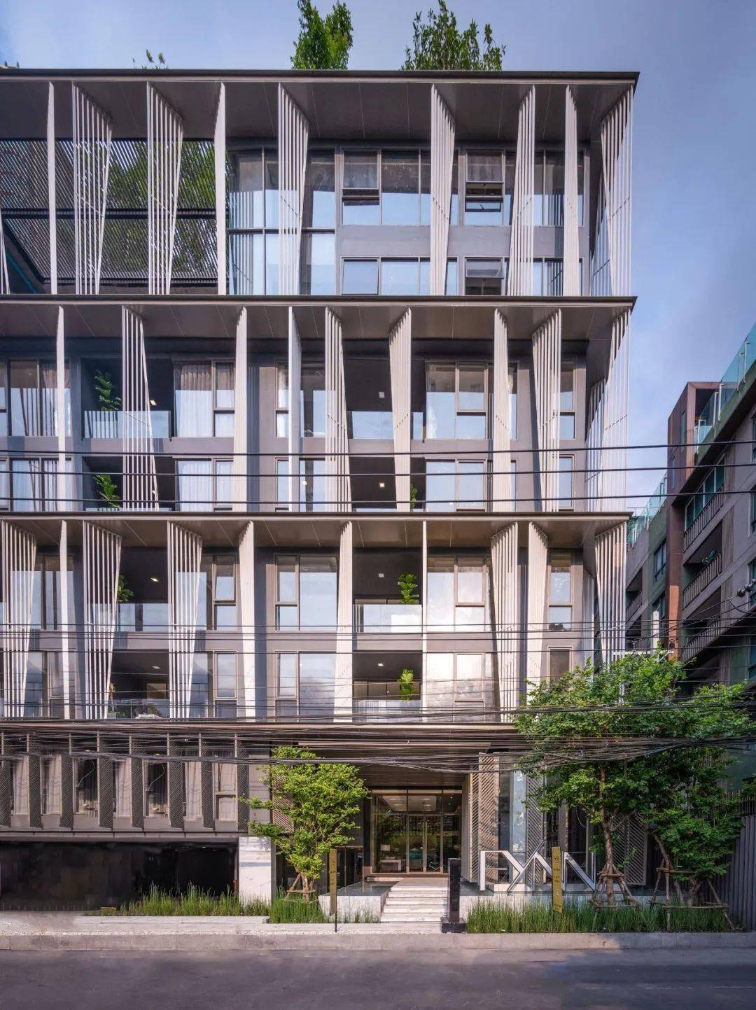 67精致低层建筑改造的外立面花瓣元素简直是国际化