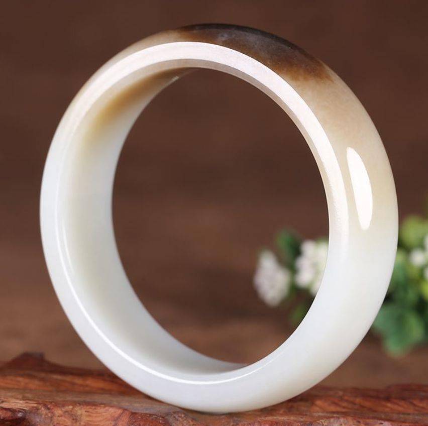 和田玉糖玉中的糖叫做糖色看见了糖玉就像抹了蜜一样甜