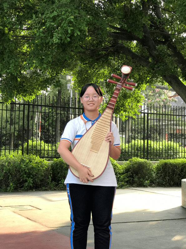 为校添彩民乐飘飘处处闻