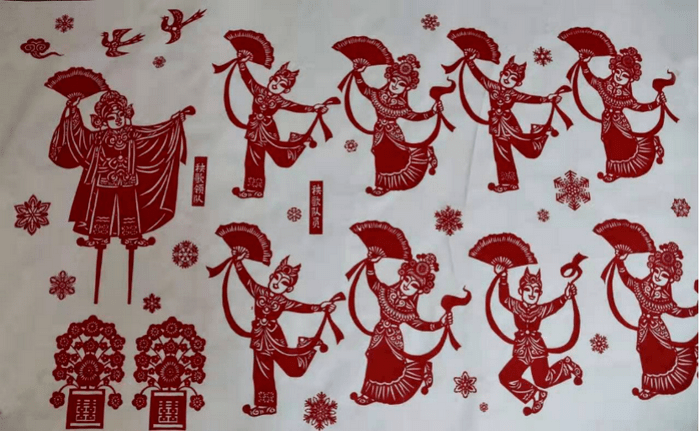 《东北大秧歌》剪纸长卷长22.5米,宽1.2米,人物多达135人.