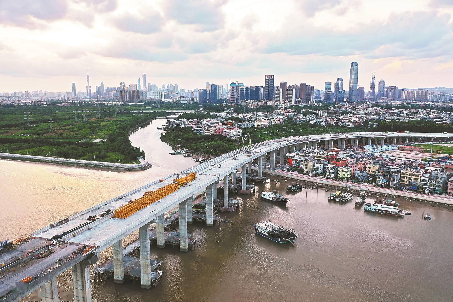 官洲河特大桥顺利合龙新化快速路力争7月1日全面通车