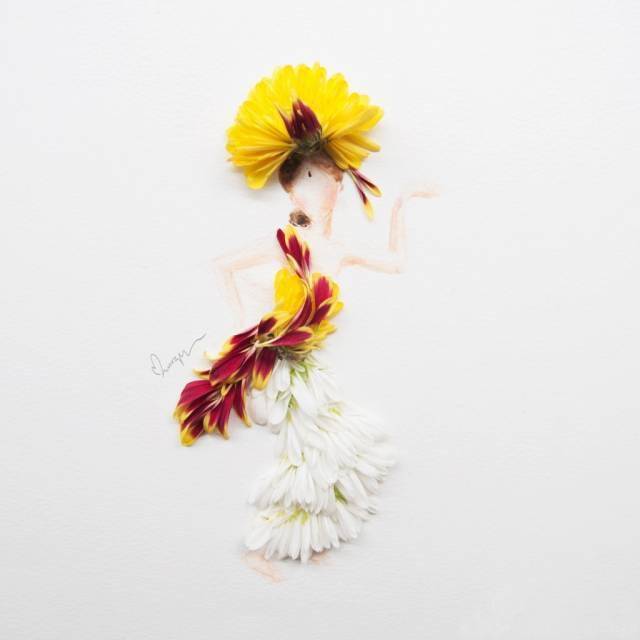 热情的巴厘島舞娘月季花裙摆花瓣的造型和人物的动作互相映衬,浑然