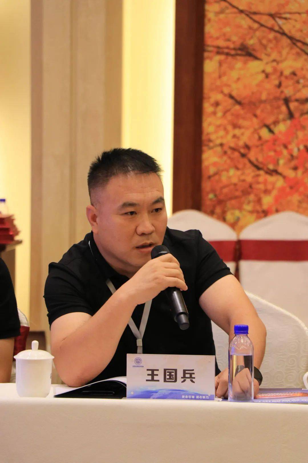 最后,由省民促会第二届会长王国华作总结讲话.