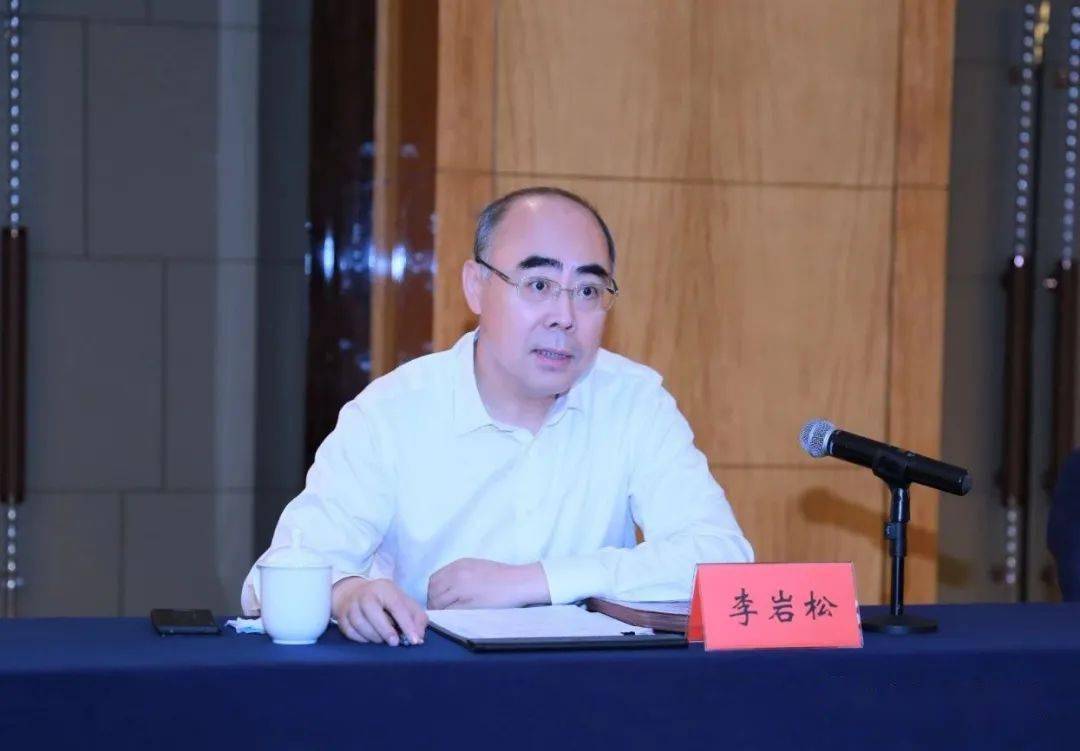李岩松与哈电集团总经理吴伟章座谈交流_大庆