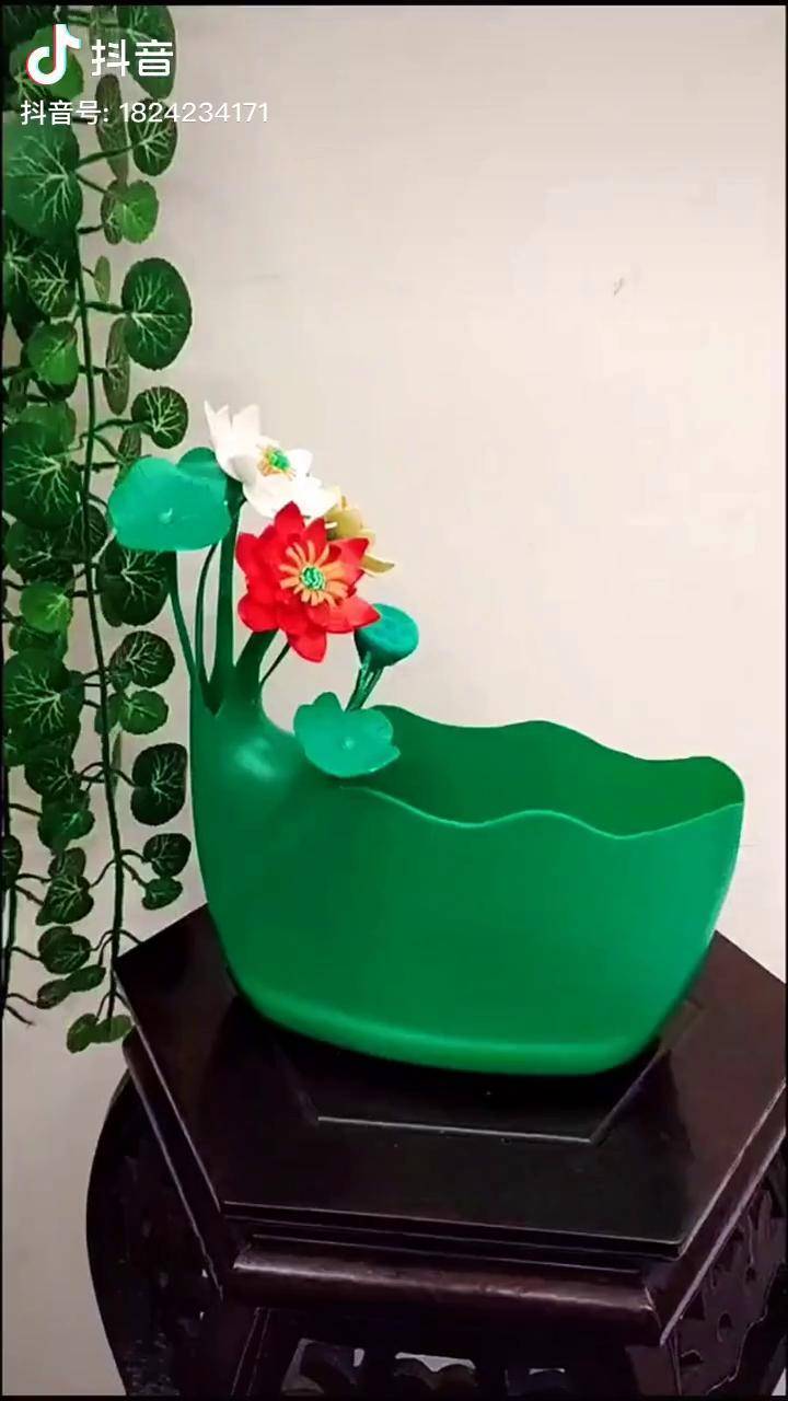 洗衣液瓶子怎样做花盆图片
