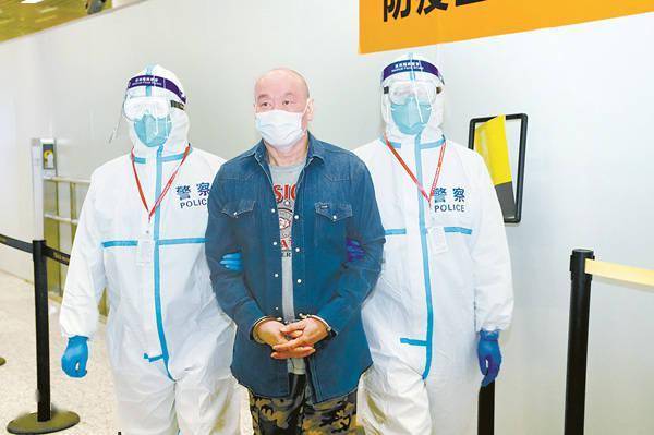 广东今年以来共追回外逃人员135人_余文斌_关秩龙_冼国良