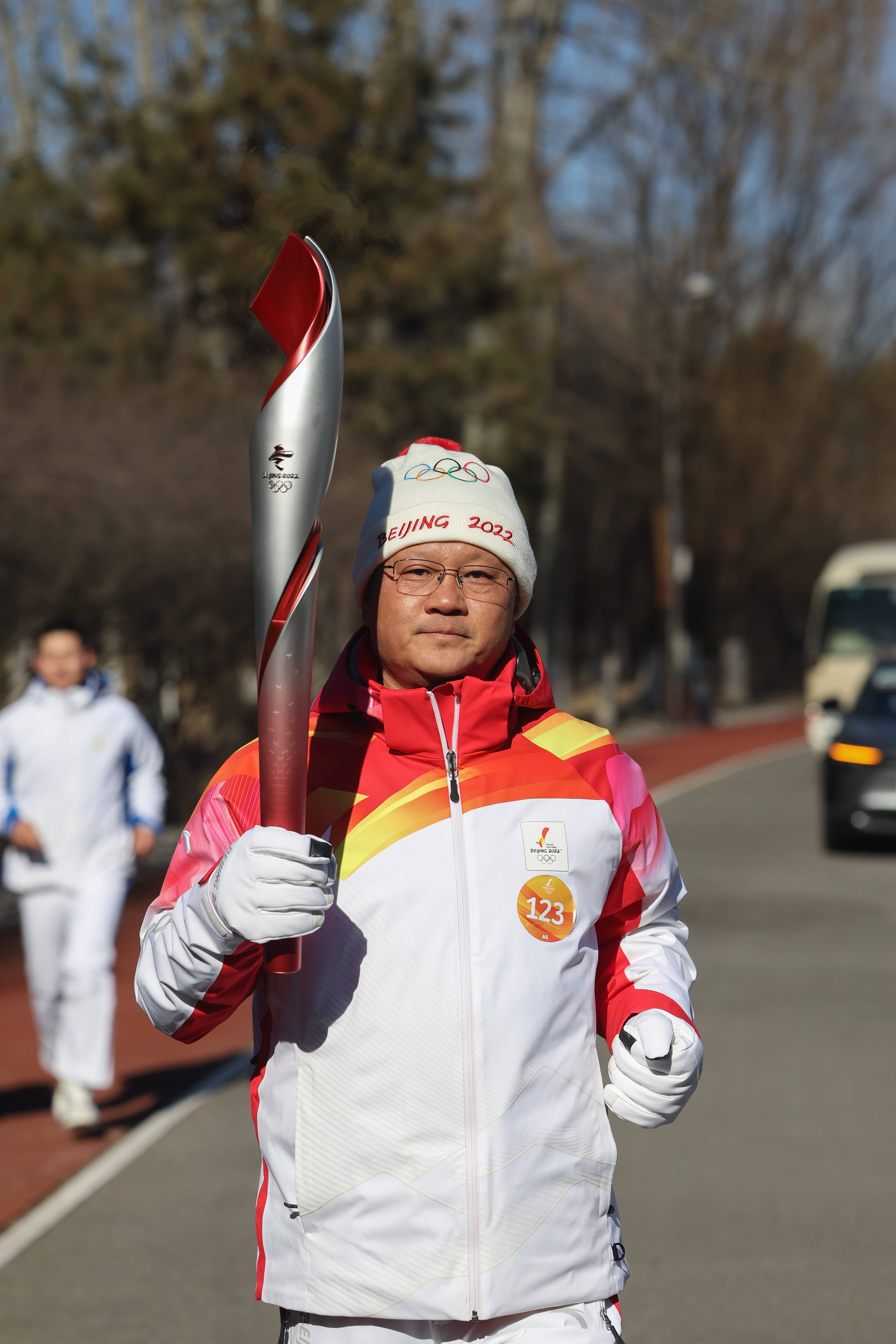 东奥会火炬传递图片