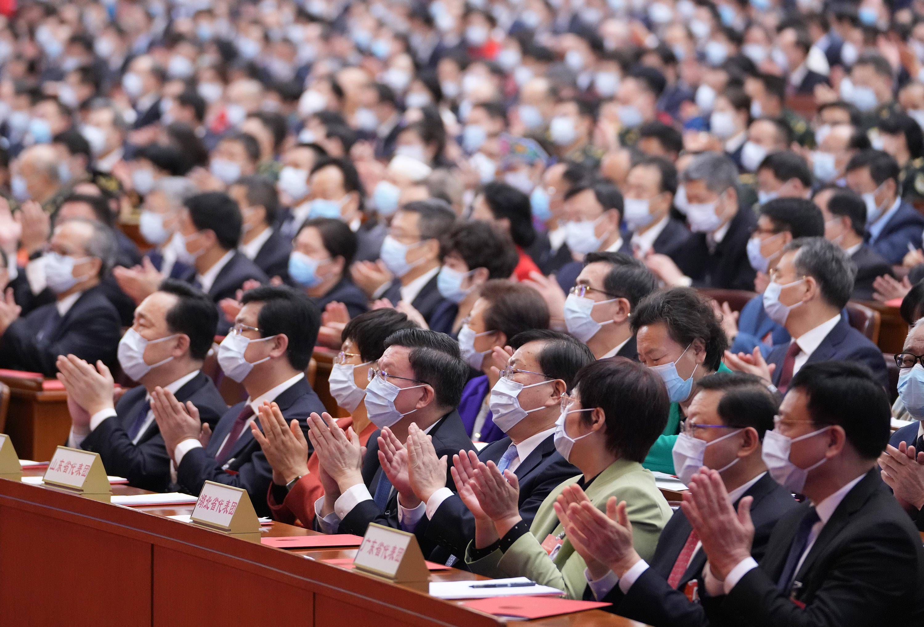 十三届全国人大五次会议在北京闭幕新华社照片,北京,2022年3月11日