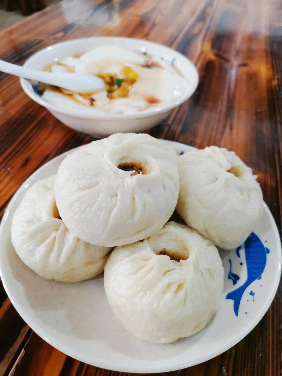 1分钟抢空一笼藏匿在龙游阳光小区的这家包子铺吃一口我就沦陷了