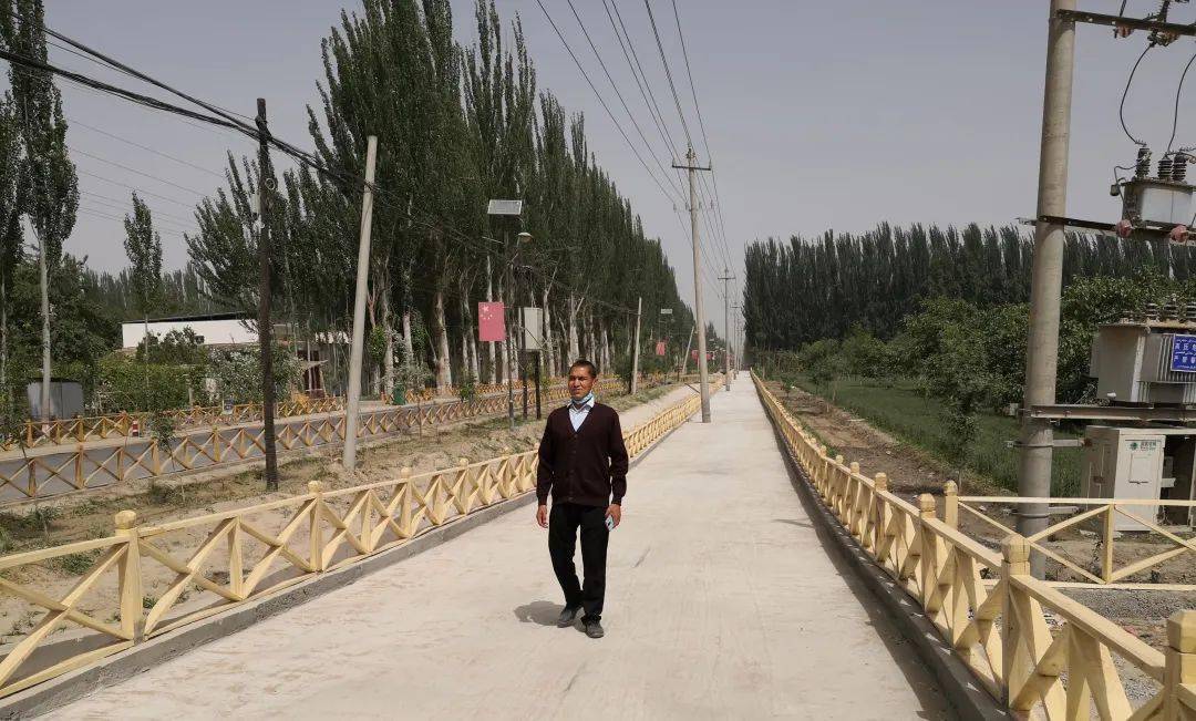 人行道建成通行于田县木尕拉镇巴什喀群村的大力协助下在新疆机场集团