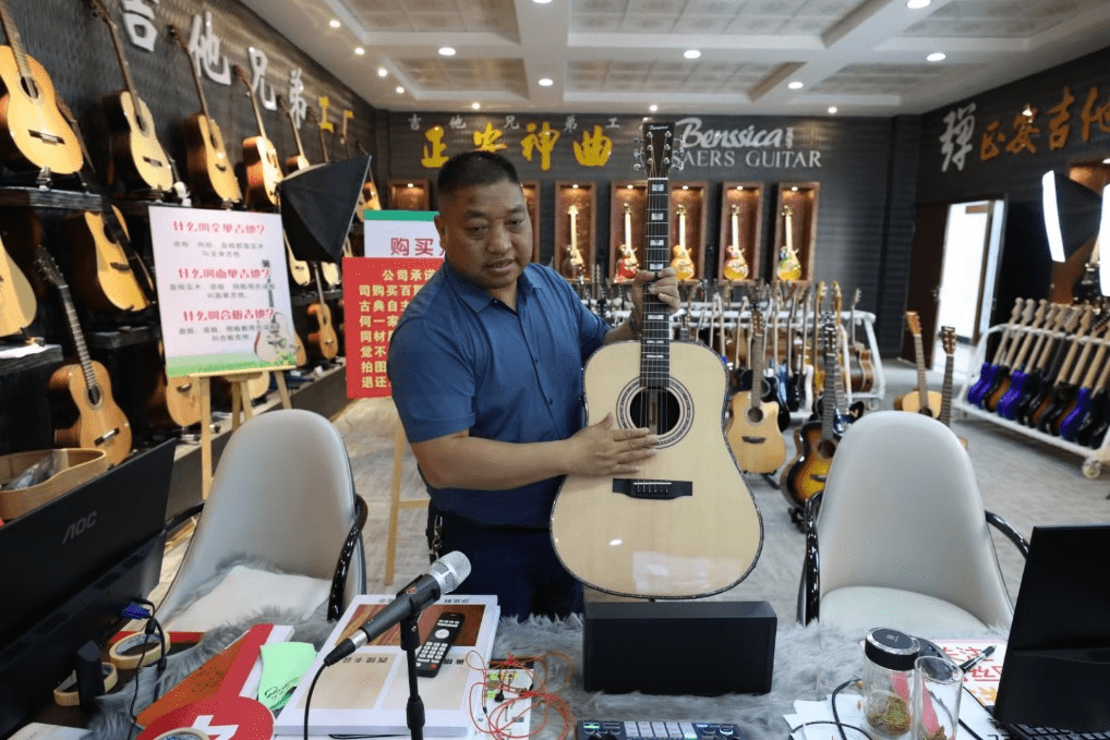 满帮:用数字运力助力贵州正安打造中国吉他制造之乡_郑传_安吉_正安县