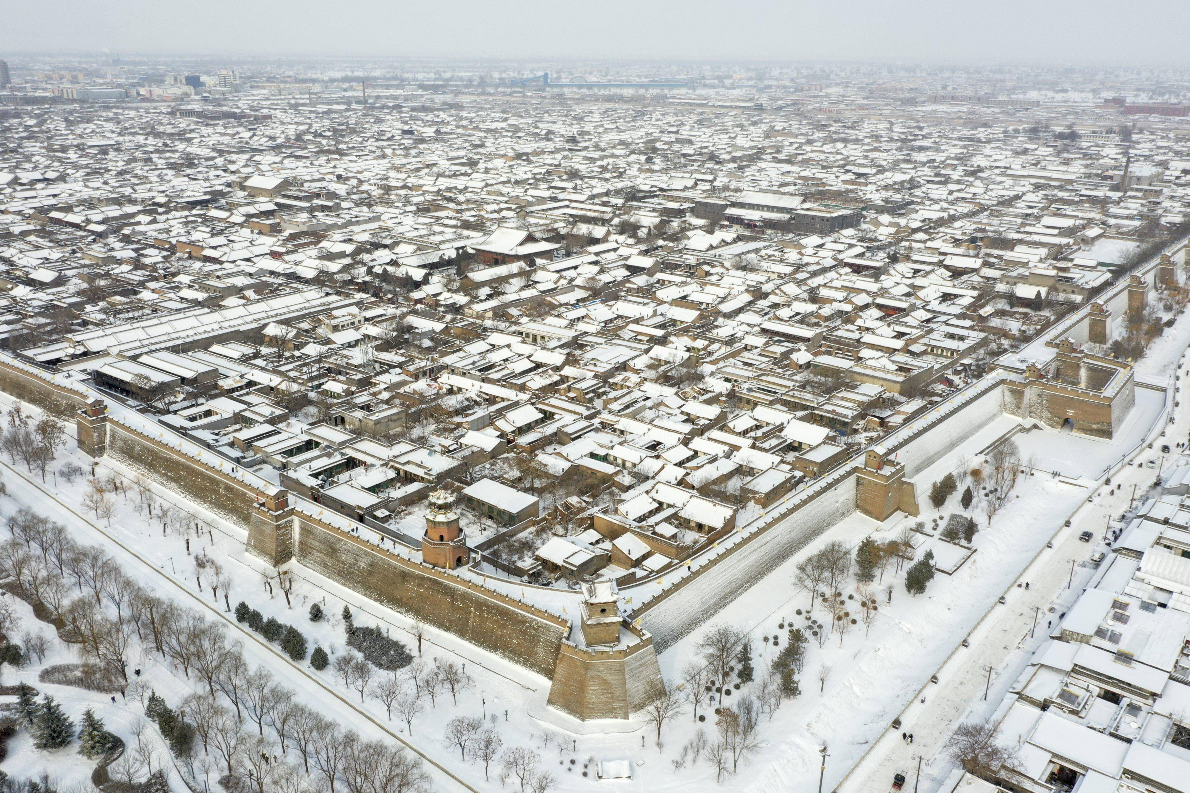 平遥古城雪景图片