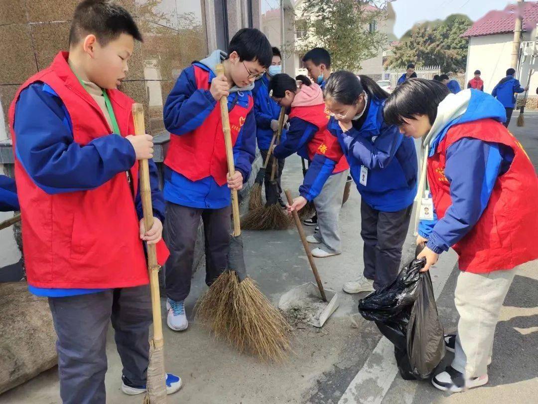 学雷锋日,来看安吉学子争做追"锋"少年_活动_中小学_志愿