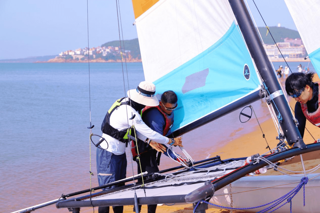 中国威海hobie帆船公开赛,选手已进场试水航行_国际_进行_筹备工作