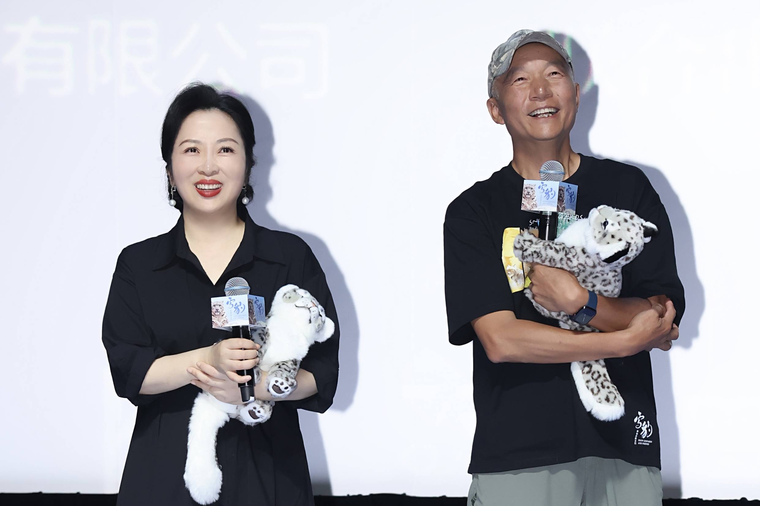 监制李玮和导演奚志农6969此前的多次展映,点映,《雪豹和她的朋友